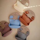 Mushie Silikoninis seilinukas - Geltona - Uogų kopos