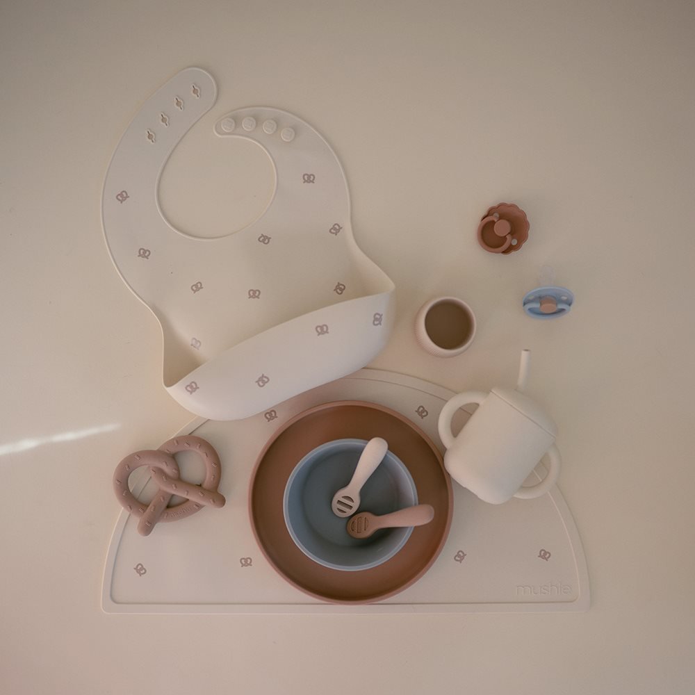 Mushie Silikoninis seilinukas - Pretzel - Uogų kopos