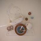 Mushie Silikoninis seilinukas - Pretzel - Uogų kopos