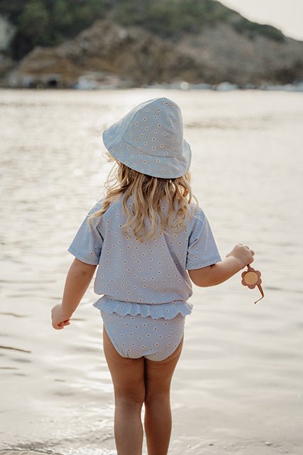 Little Dutch Užrišama dvipusė kepurė nuo saulės "Daisies Blue/White" - Uogų kopos